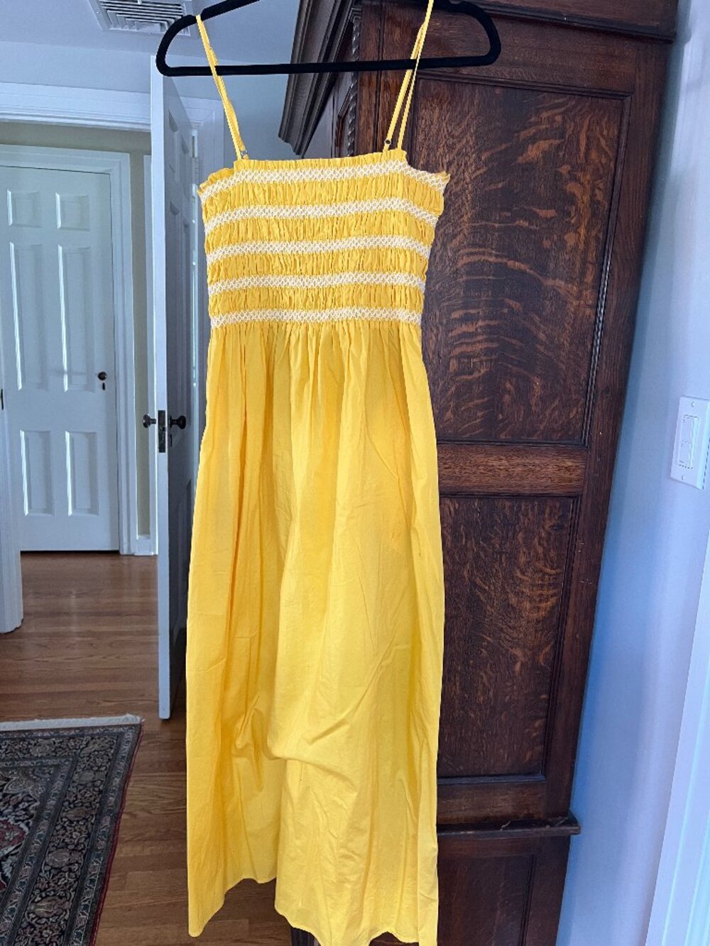 Yellow sundress by Pistola with smocking at bust